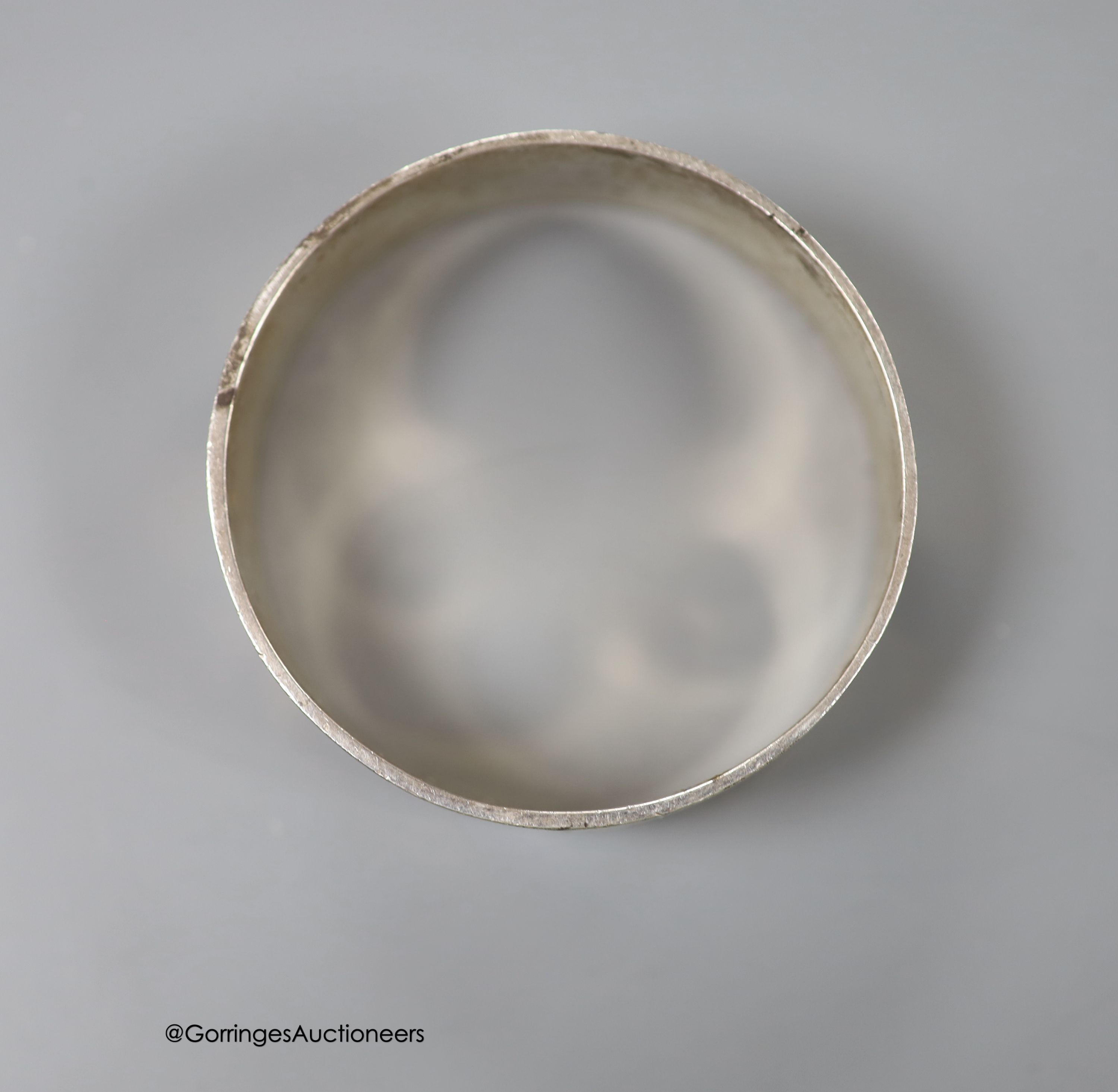 A modern Paloma Picasso for Tiffany & Co 925 and two colour enamel bangle, interior diameter approx. 62mm, gross weight 72.9 grams (a.f.).